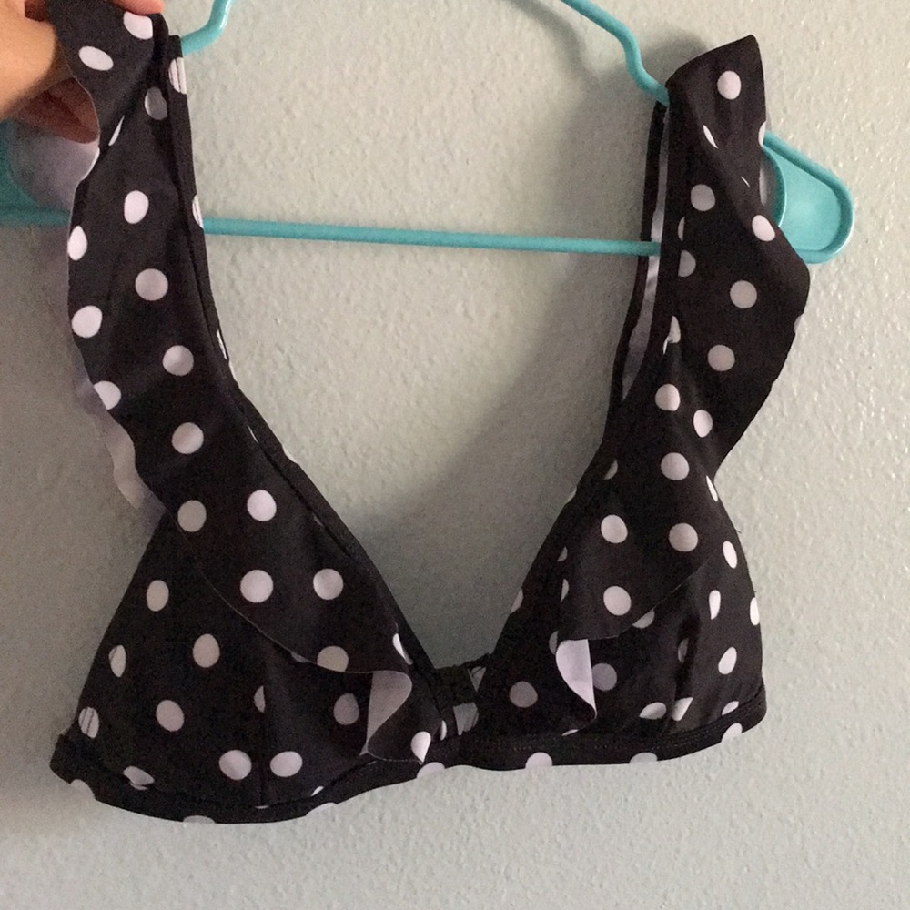 Black polka dot bathing suit